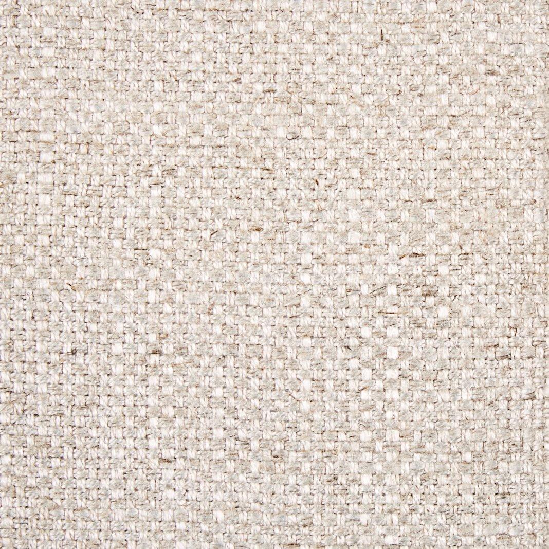 a close up of a beige fabric with a woven pattern