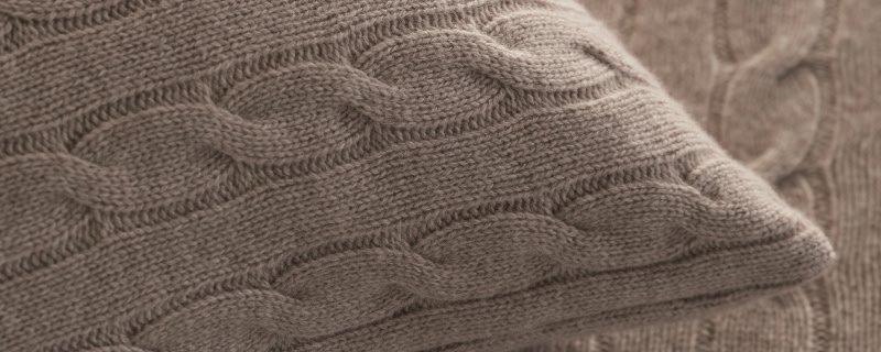 a close up of a brown fabric with a pattern on it