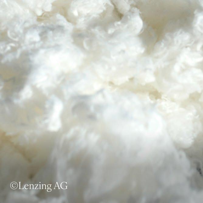 a close up of a pile of white fluffy stuff on a table