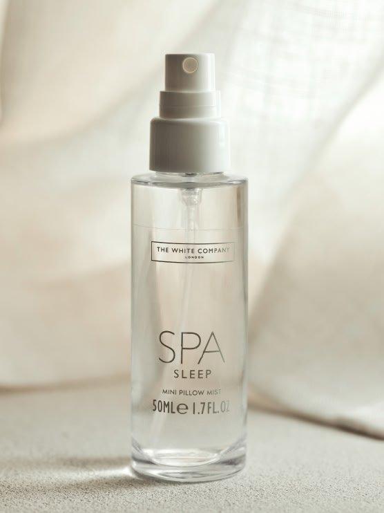 a bottle of a spa sleep spray sitting on a table