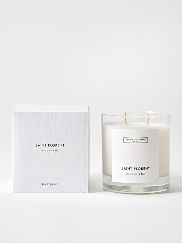 saint florent candle in white box next to white box