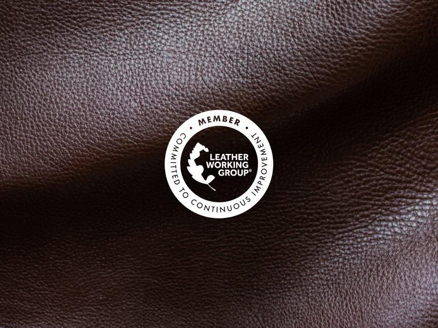 a brown leather patch with the logo of the leather group